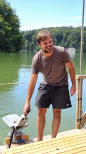 Olivier driving the boat